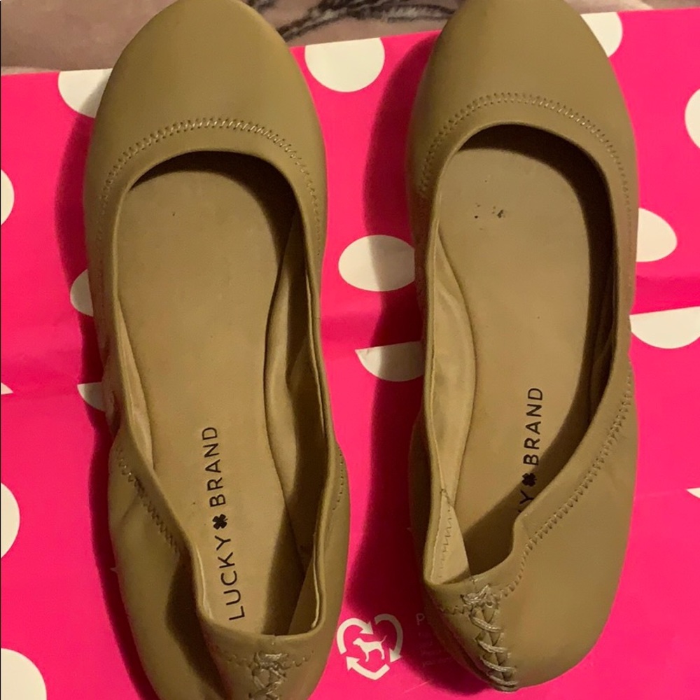A pair of leather  ballerina flats .